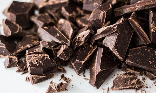 Chunks of dark chocolate on a table