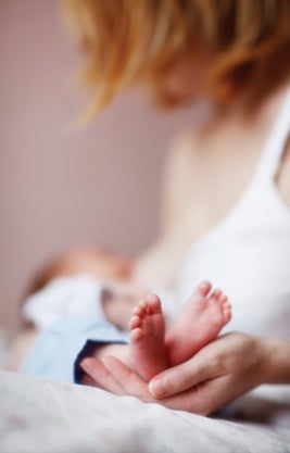 Mother holding newborn baby